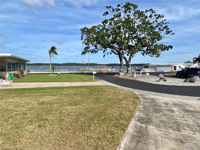 a view of a swimming pool and an outdoor space