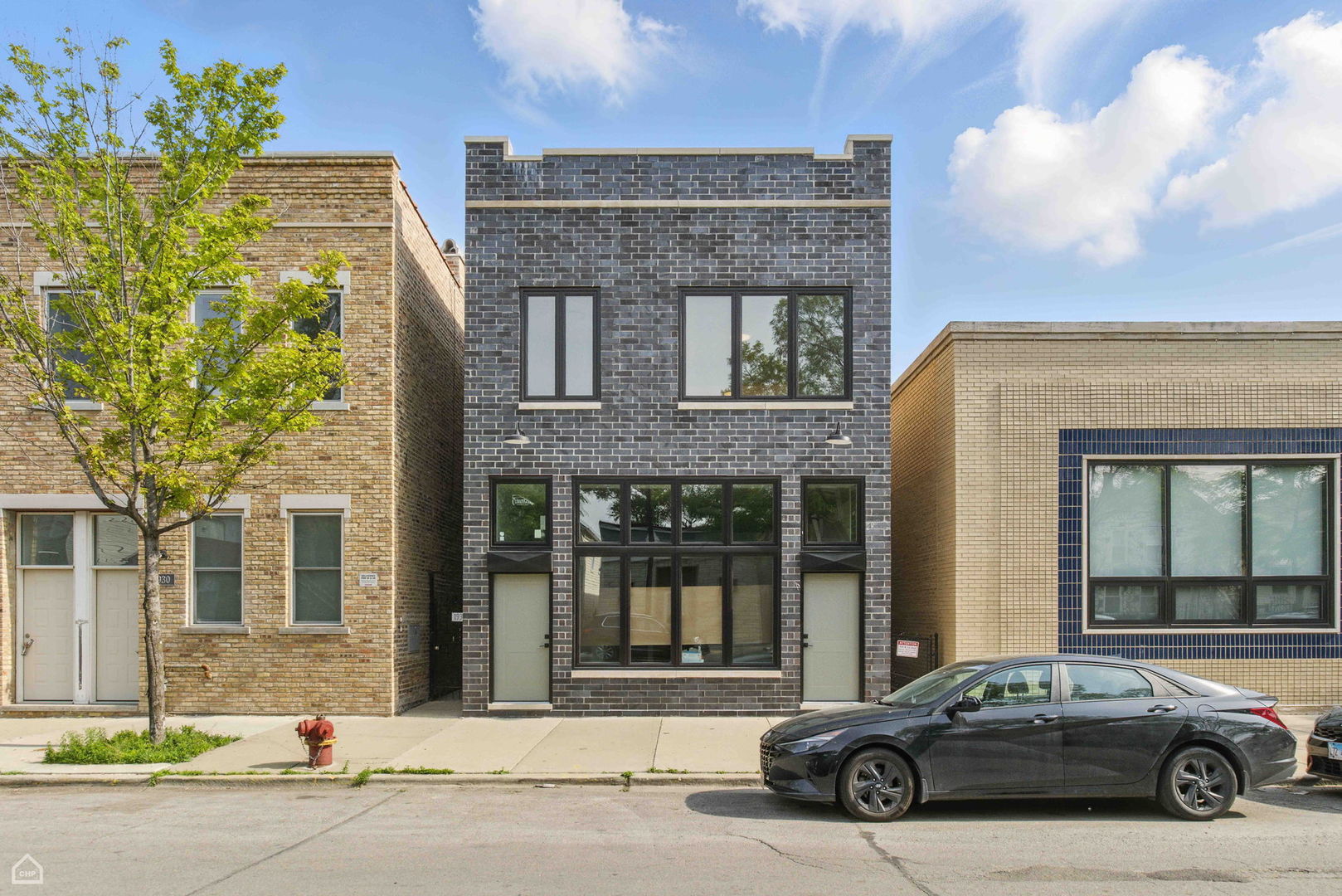 1928 West 21st Street, Unit 2F Chicago, IL 60608 - Photo 15 of 16 a car parked in front of a building