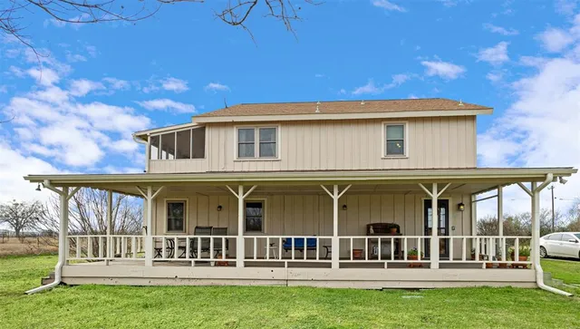a view of a house with a deck