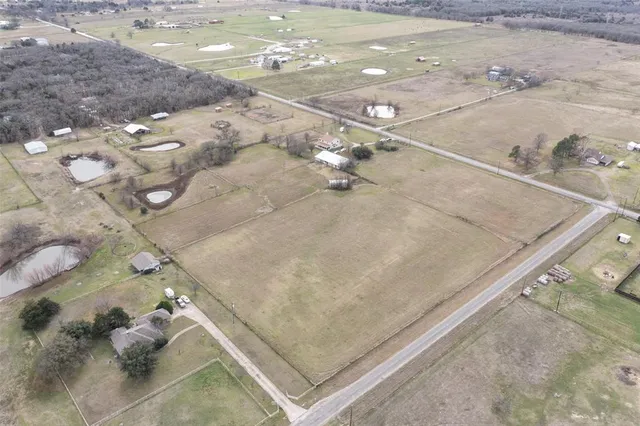 a dirty bathroom with white tiles