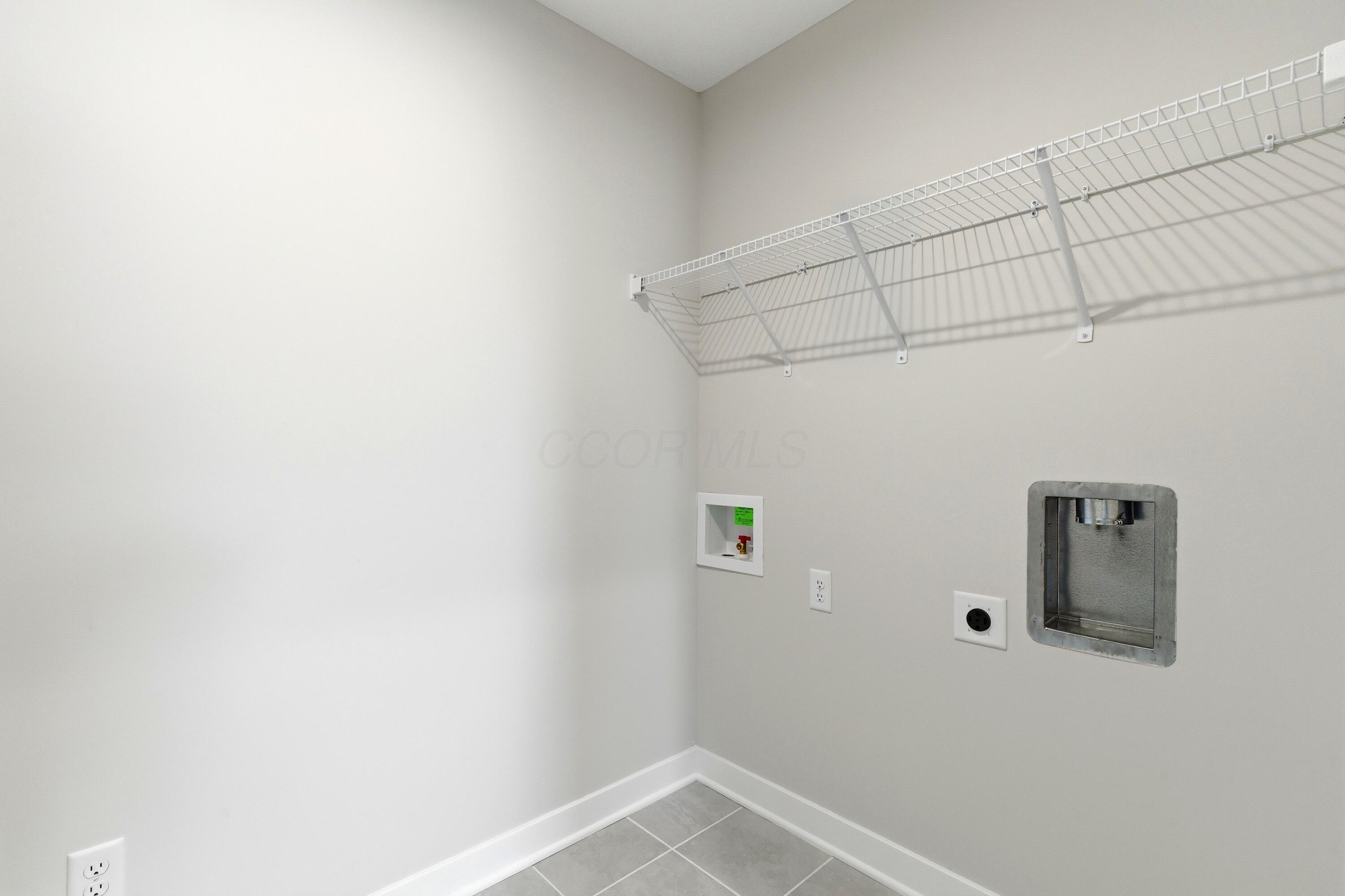 124 Steeplechase Street Delaware, OH 43015 - Photo 51 of 64 Upstairs Laundry Room