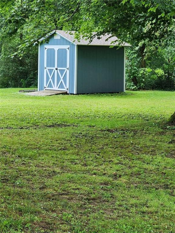 154 Bend Road New Wilmington, PA 16142 - Photo 19 of 22 a view of a yard with a house in the background