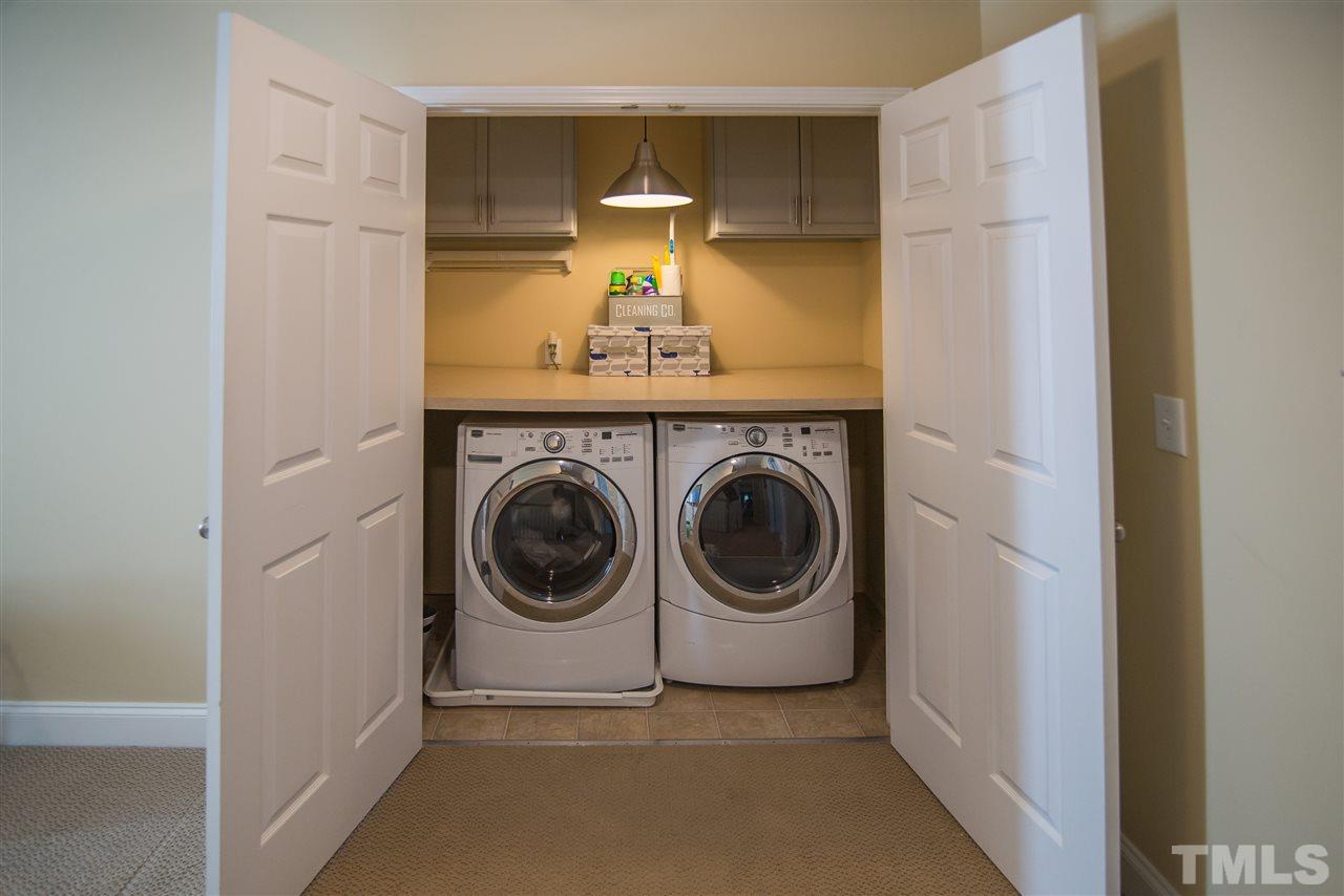 10715 Friendly Neighbor Lane Raleigh, NC 27614 - Photo 20 of 25 Upstairs laundry-No more lugging the clothes upstairs!