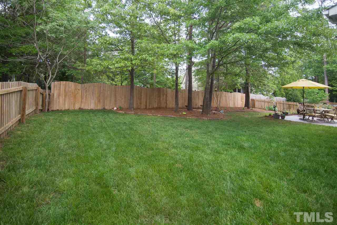 10715 Friendly Neighbor Lane Raleigh, NC 27614 - Photo 23 of 25 Private, fenced in backyard with irrigation system. Backs up to the HOA preserve