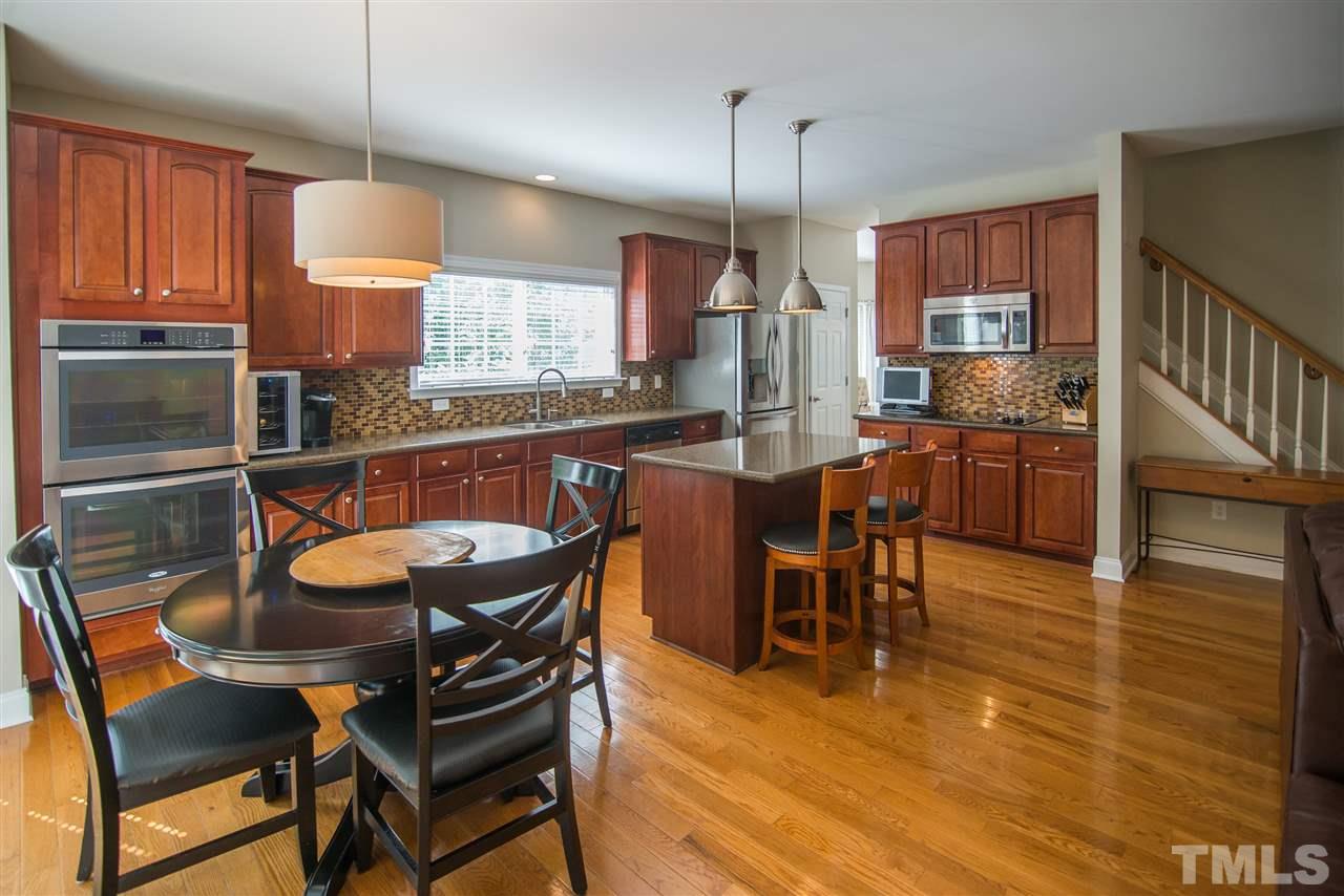 10715 Friendly Neighbor Lane Raleigh, NC 27614 - Photo 5 of 25 The central hub of your home! Check out that new (2016)oven!
