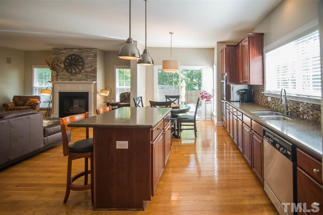 10715 Friendly Neighbor Lane Raleigh, NC 27614 - Photo 6 of 25 Kitchen is nice and open so you can still be with everyone while cooking!