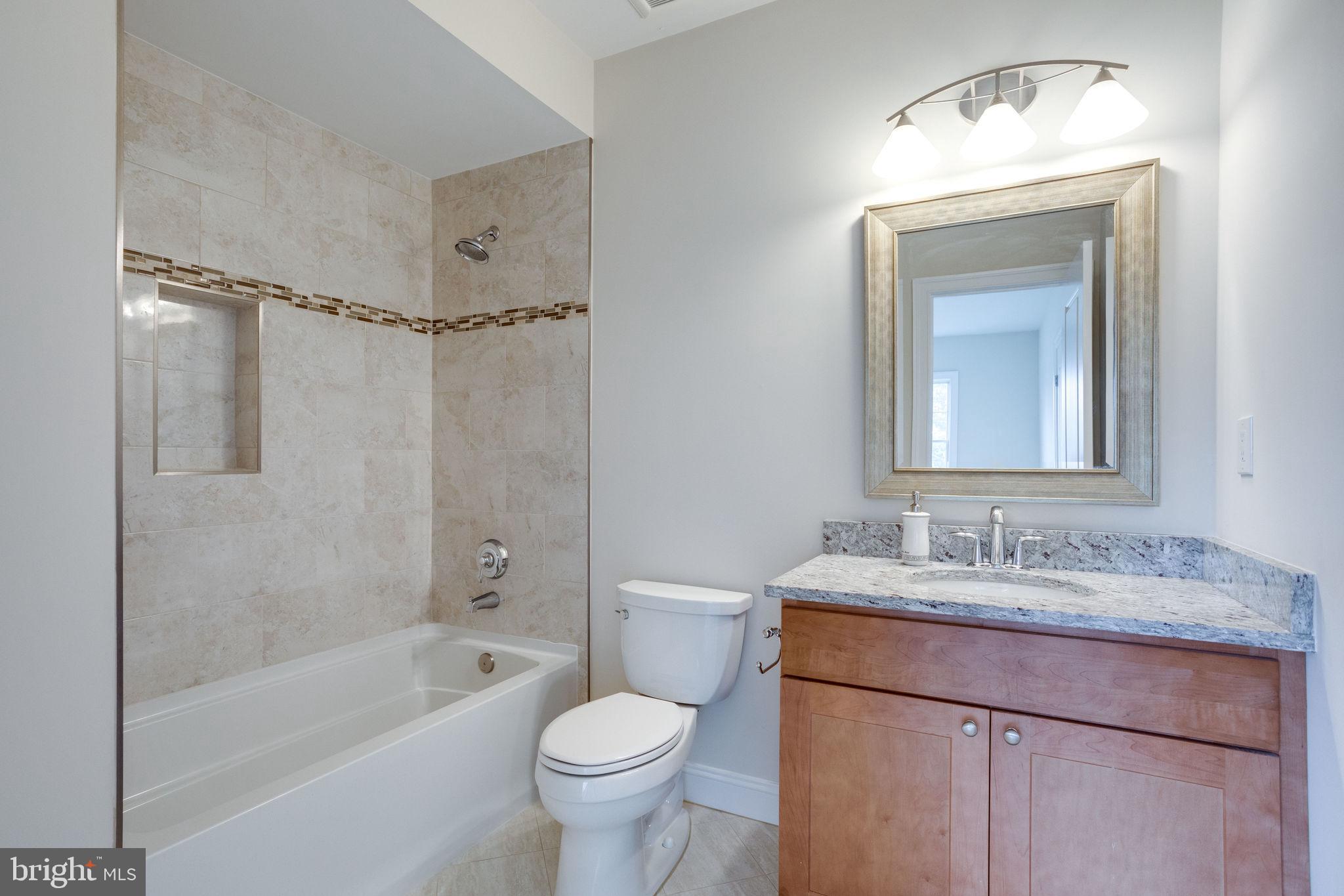 1302 Calder Road McLean, VA 22101 - Photo 54 of 90 Full bath for top level 3rd bedroom