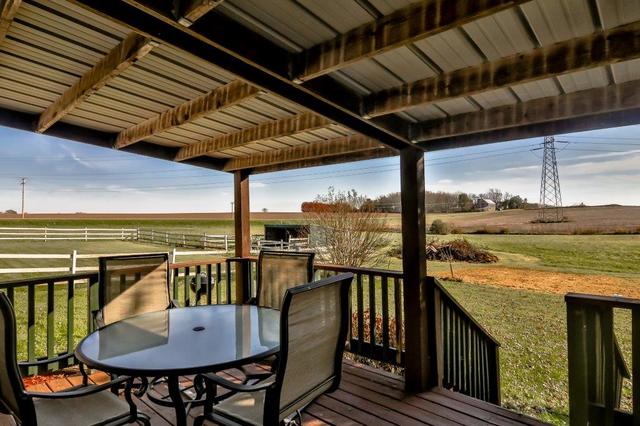 5901 Rotary Road Cherry Valley, IL 61016 - Photo 17 of 19 a view of a balcony dining area with furniture