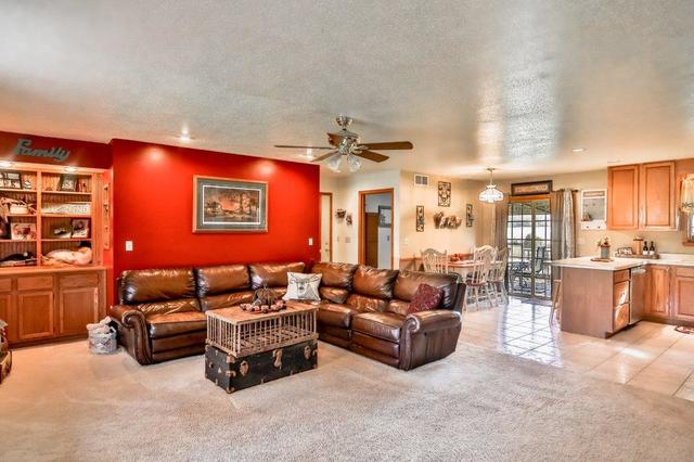 5901 Rotary Road Cherry Valley, IL 61016 - Photo 4 of 19 a bedroom with furniture and a couch