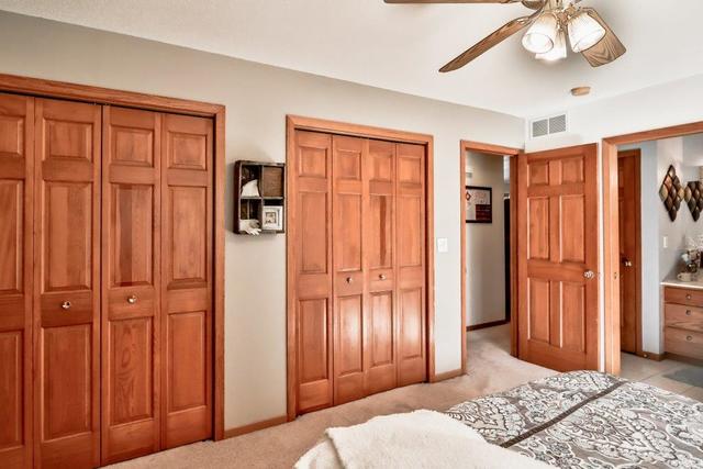 5901 Rotary Road Cherry Valley, IL 61016 - Photo 9 of 19 a bedroom with furniture and windows