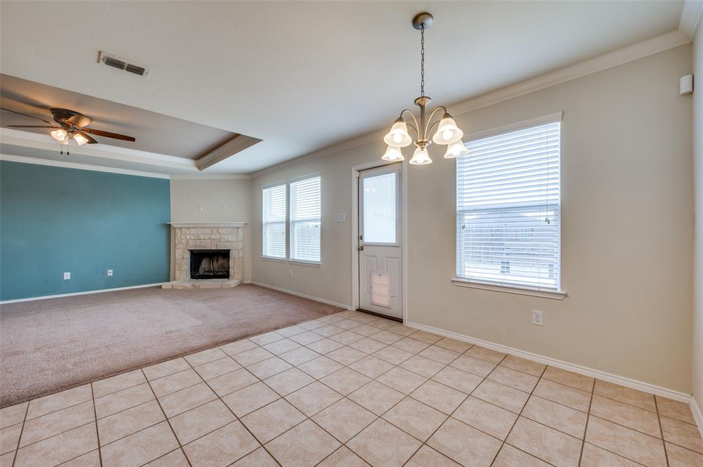 1420 Rivers Creek Lane Little Elm, TX 75068 - Photo 16 of 25 a view of an empty room with window and fire place