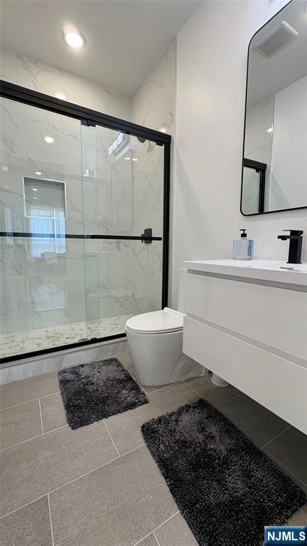 367 Devon Street, Unit 2 Kearny, NJ 07032 - Photo 23 of 30 a bathroom with a sink toilet and shower