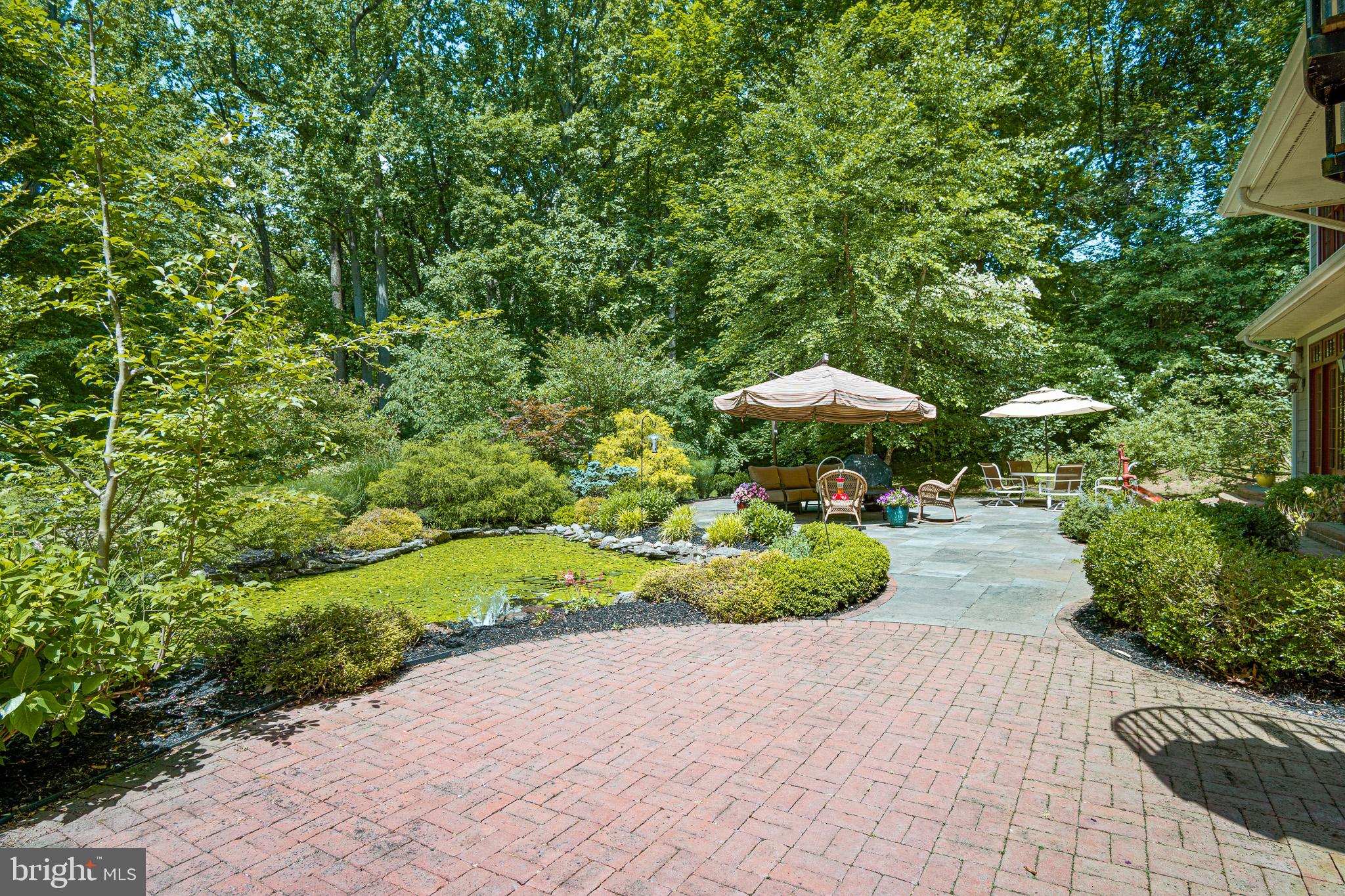 531 Webb Road Chadds Ford, PA 19317 - Photo 11 of 18 a front view of a house with a yard and trees