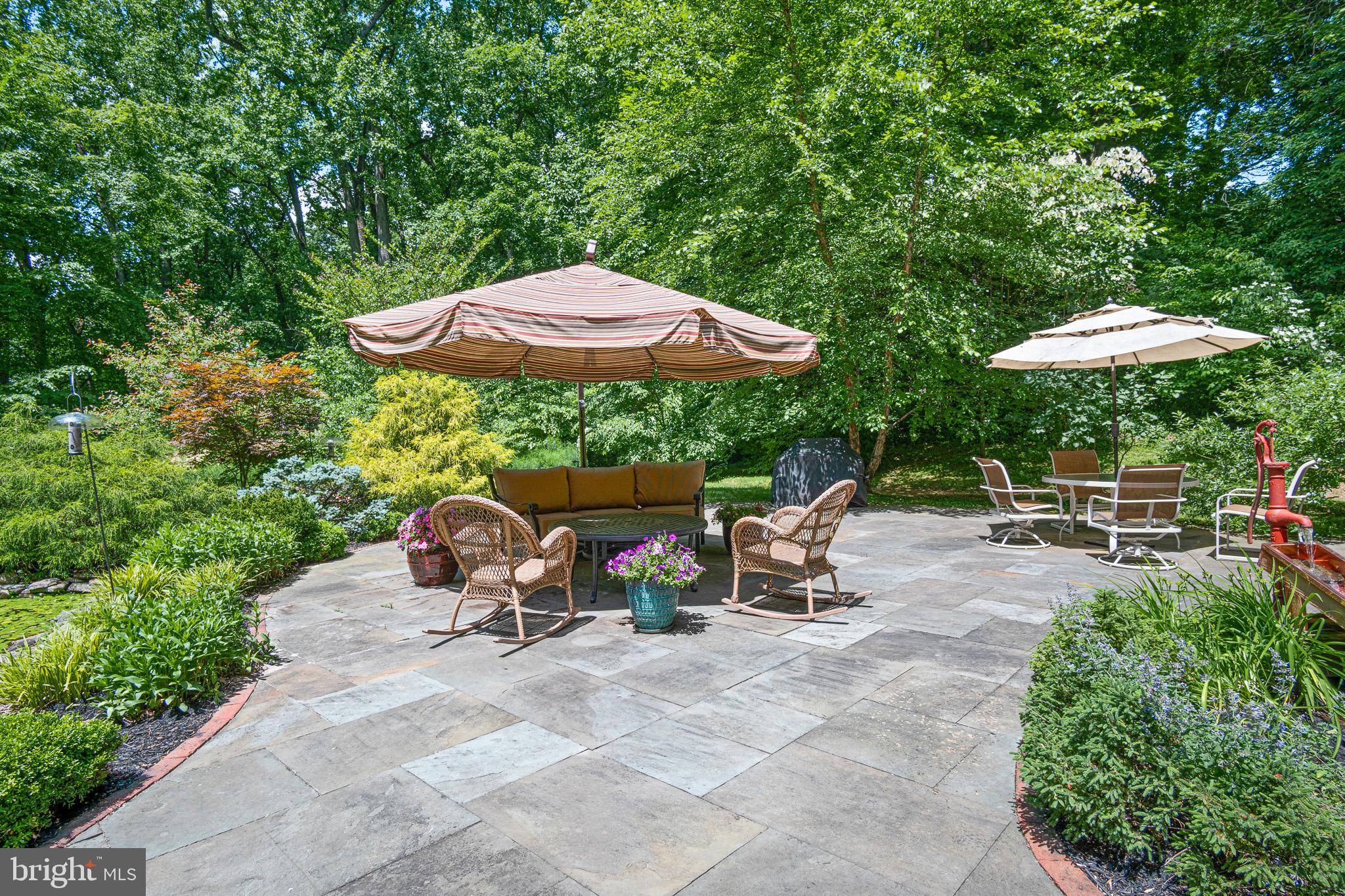 531 Webb Road Chadds Ford, PA 19317 - Photo 12 of 18 an outdoor space with patio and white umbrellas