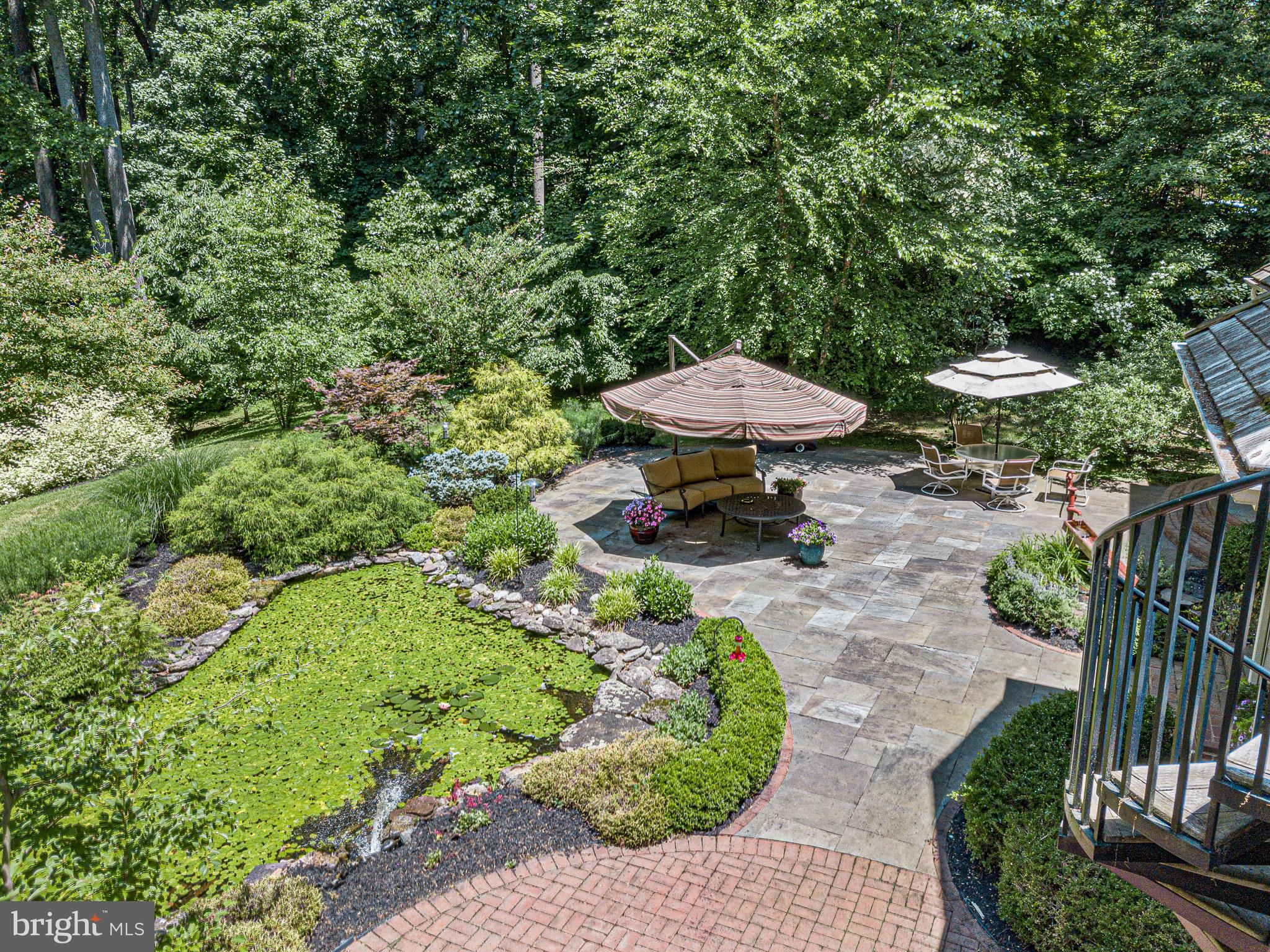 531 Webb Road Chadds Ford, PA 19317 - Photo 14 of 18 a view of a table and chairs in backyard