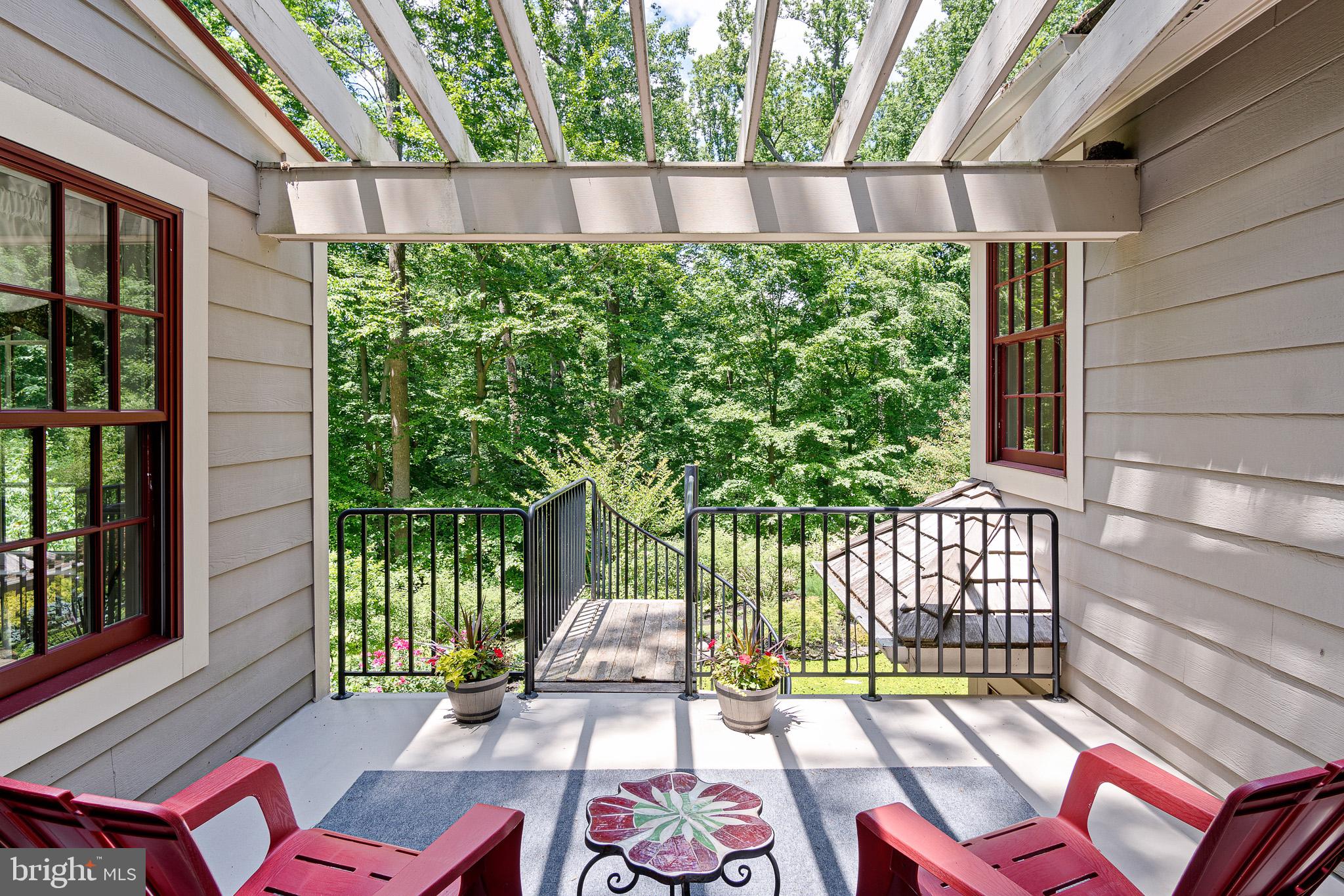 531 Webb Road Chadds Ford, PA 19317 - Photo 4 of 18 a view of a two chairs in the balcony