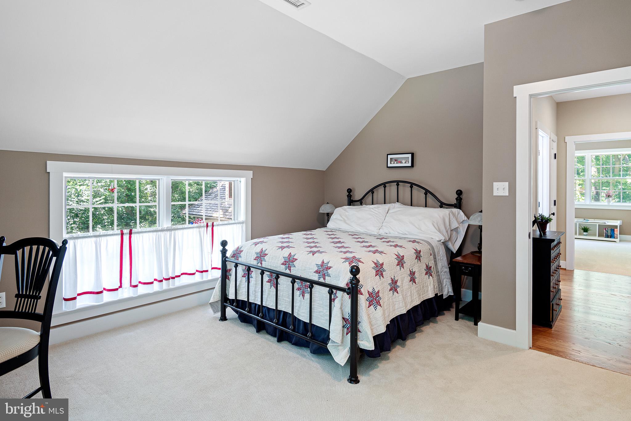 531 Webb Road Chadds Ford, PA 19317 - Photo 6 of 18 a spacious bedroom with a bed and a large window