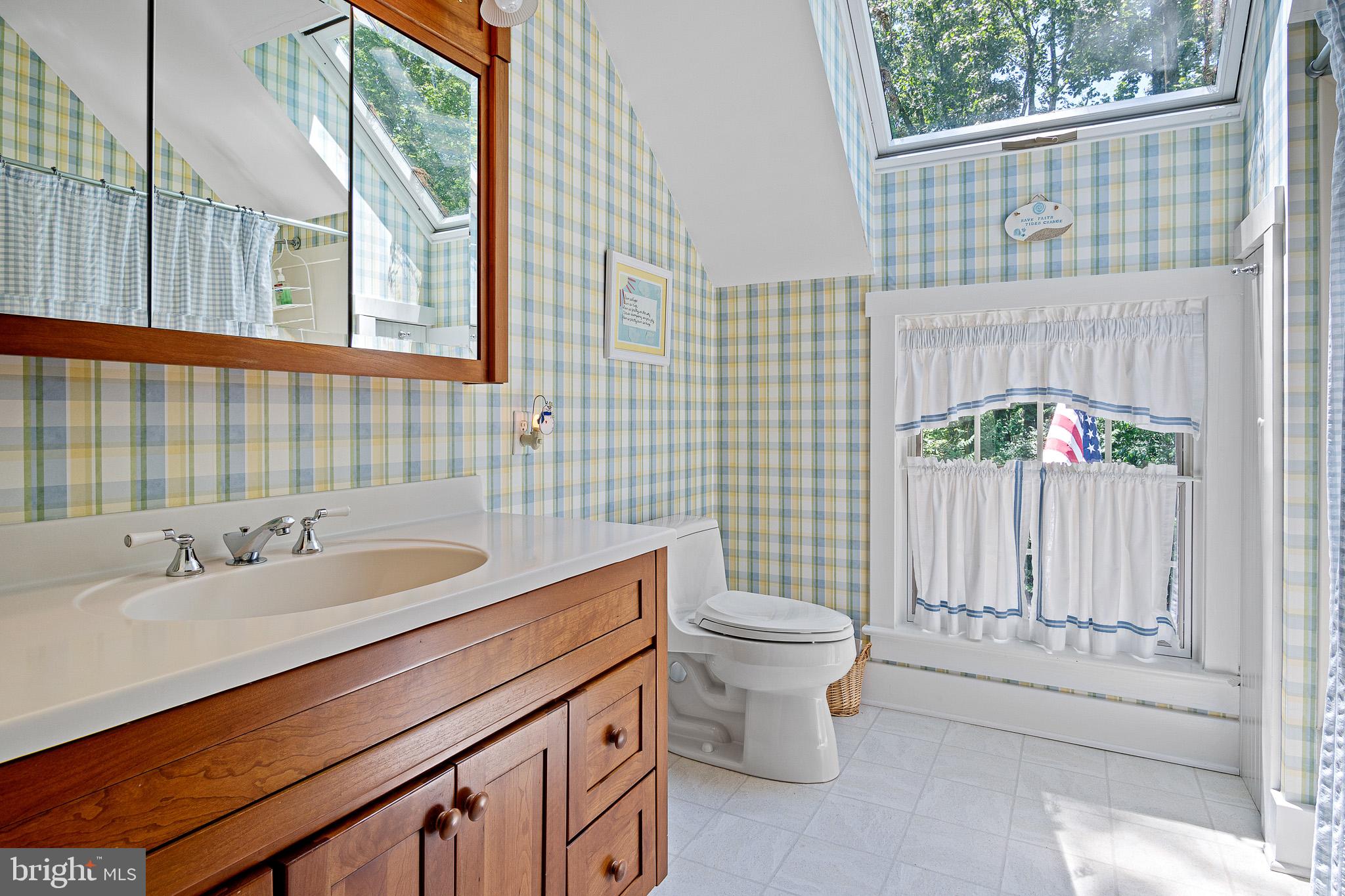 531 Webb Road Chadds Ford, PA 19317 - Photo 8 of 18 a bathroom with a sink toilet and shower
