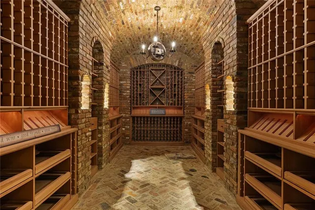 a living room with a fireplace and a fireplace