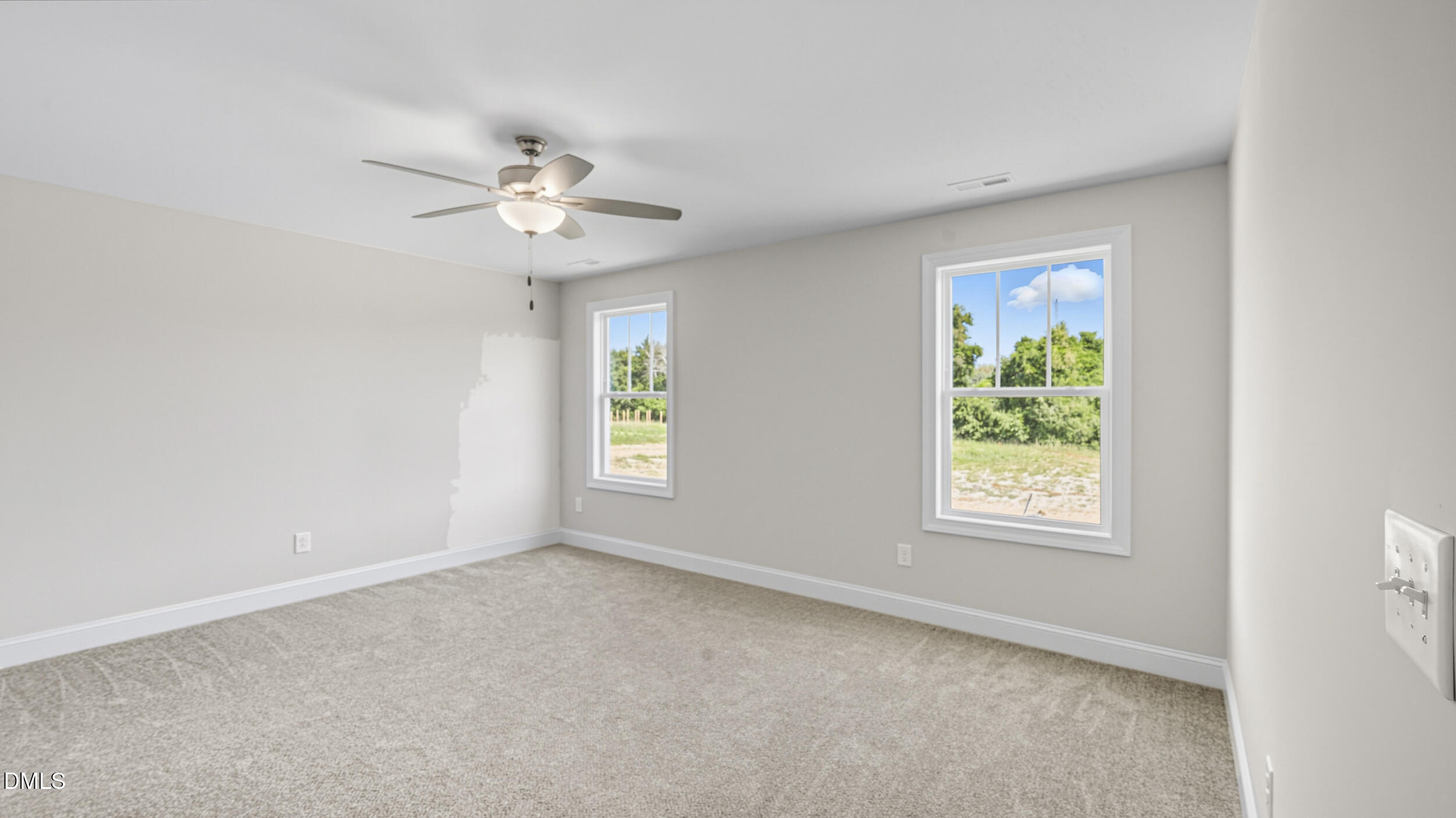 4105 Ralph Holt Court Snow Camp, NC 27349 - Photo 20 of 35 an empty room with windows and fan