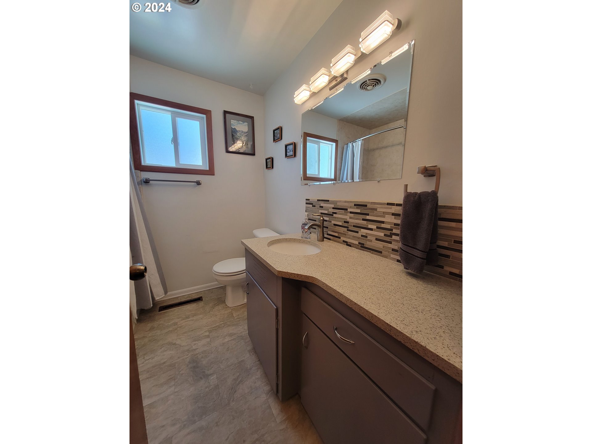 721 Southwest 29th Street Pendleton, OR 97801 - Photo 14 of 32 a kitchen with a sink and a stove