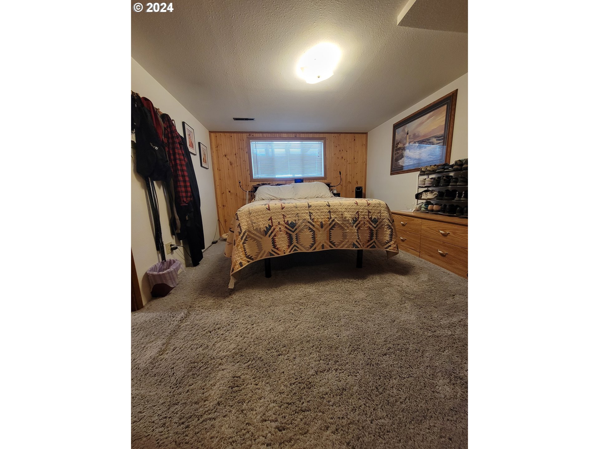 721 Southwest 29th Street Pendleton, OR 97801 - Photo 16 of 32 a bed room with a bed and a painting