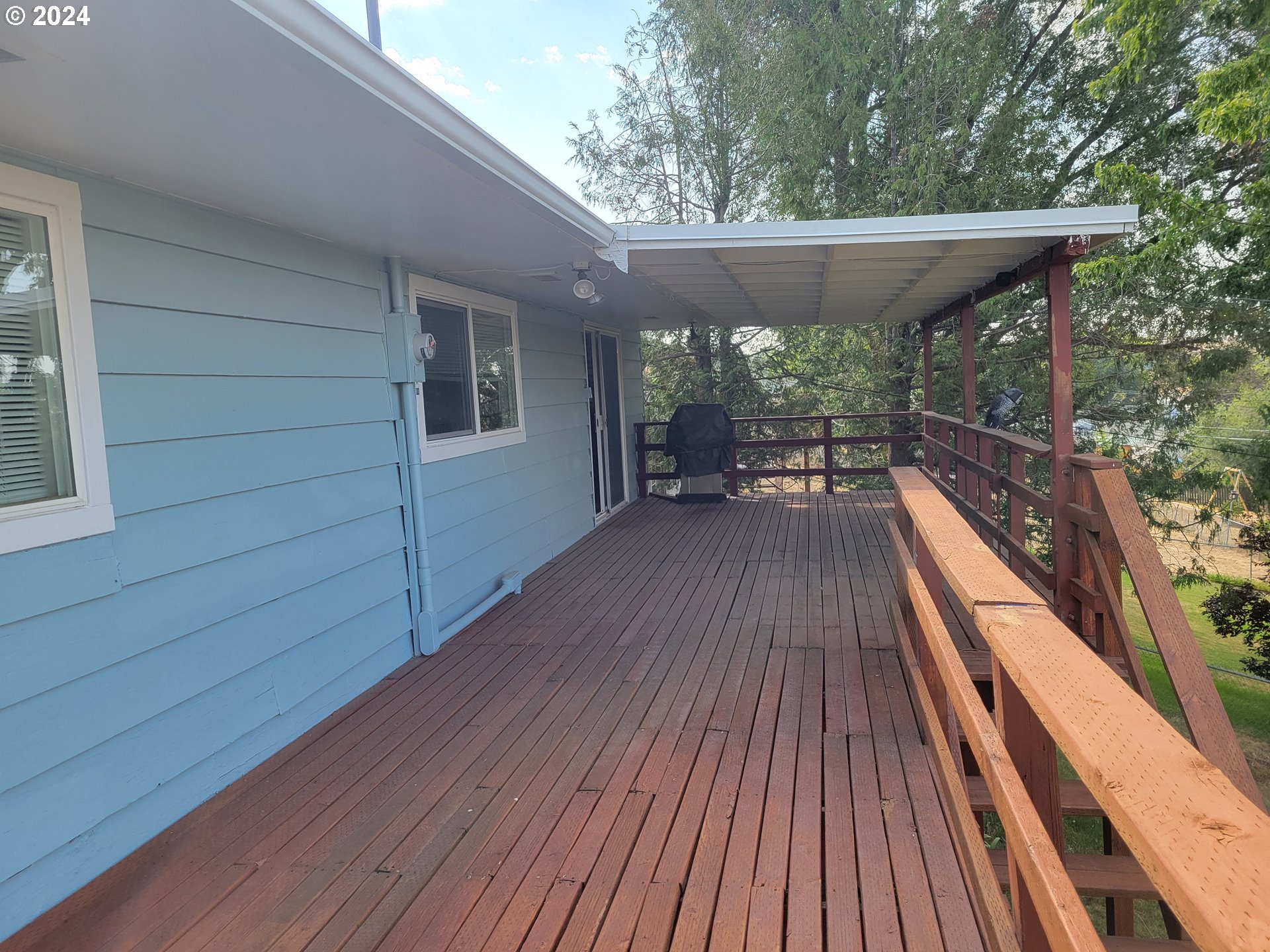 721 Southwest 29th Street Pendleton, OR 97801 - Photo 29 of 32 a view of backyard with a deck and wooden floor