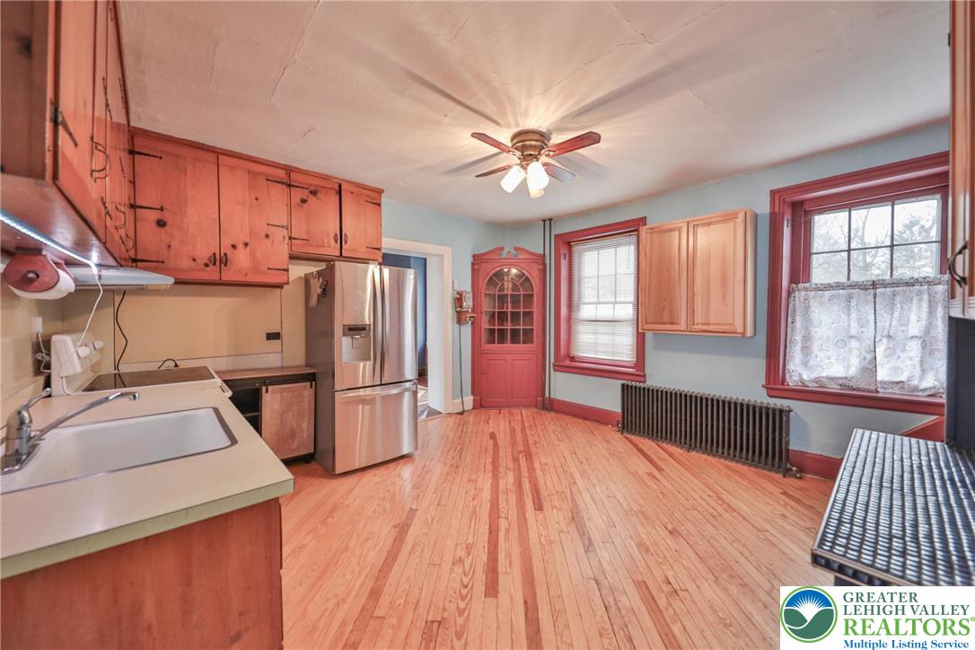1333 Spring Valley Road Bethlehem, PA 18015 - Photo 13 of 40 a kitchen with a sink appliances and cabinets