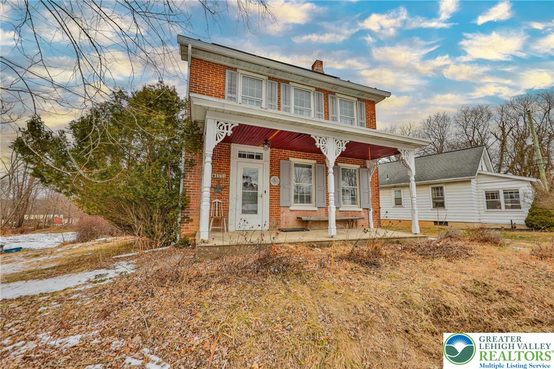 1333 Spring Valley Road Bethlehem, PA 18015 - Photo 2 of 40 a front view of a house with a garden
