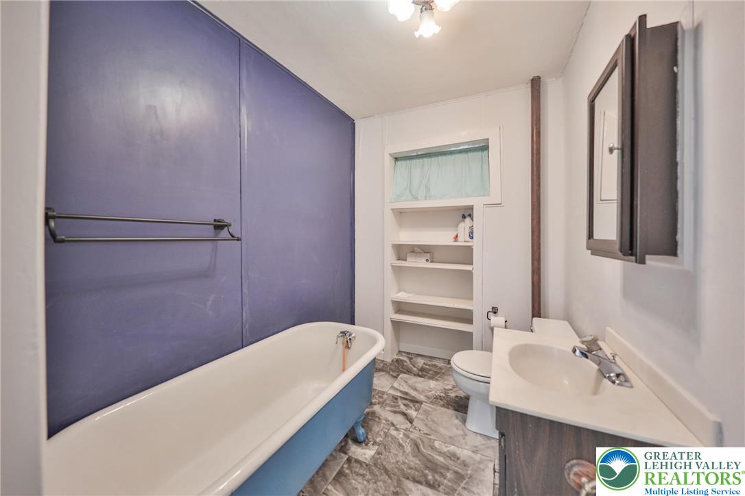 1333 Spring Valley Road Bethlehem, PA 18015 - Photo 24 of 40 a bathroom with a sink and a bathtub