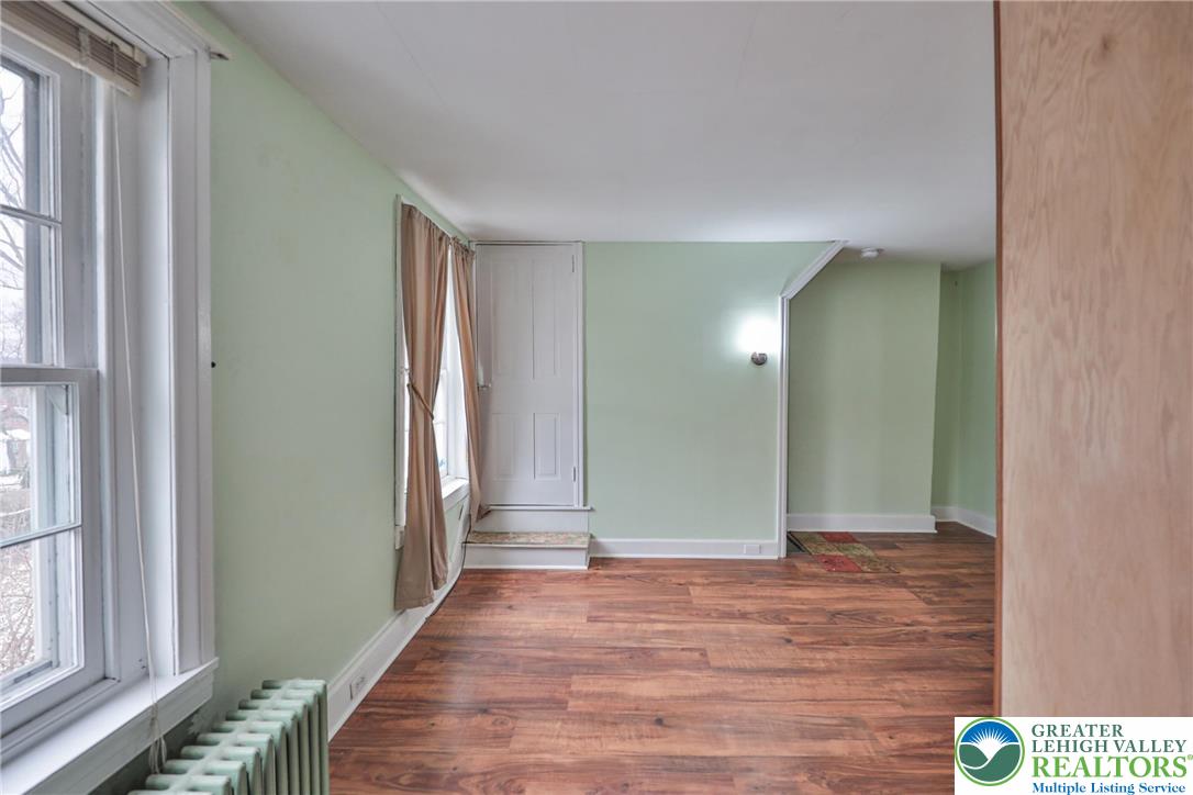 1333 Spring Valley Road Bethlehem, PA 18015 - Photo 27 of 40 a view of a hallway with wooden floor