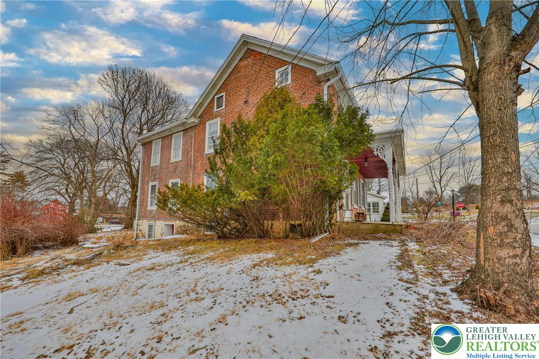 1333 Spring Valley Road Bethlehem, PA 18015 - Photo 6 of 40 a view of a house with a snow in the yard