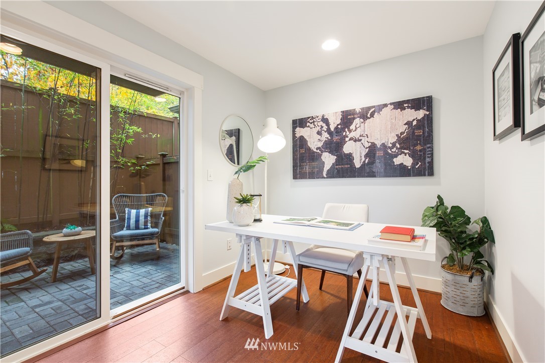 10303 Holman Road North, Unit A Seattle, WA 98177 - Photo 30 of 40 a view of a dining room with furniture window and outside view