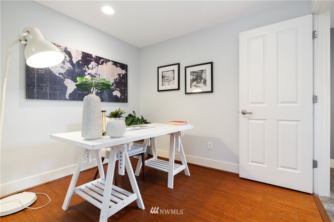 10303 Holman Road North, Unit A Seattle, WA 98177 - Photo 31 of 40 a view of a workspace with furniture and wooden floor
