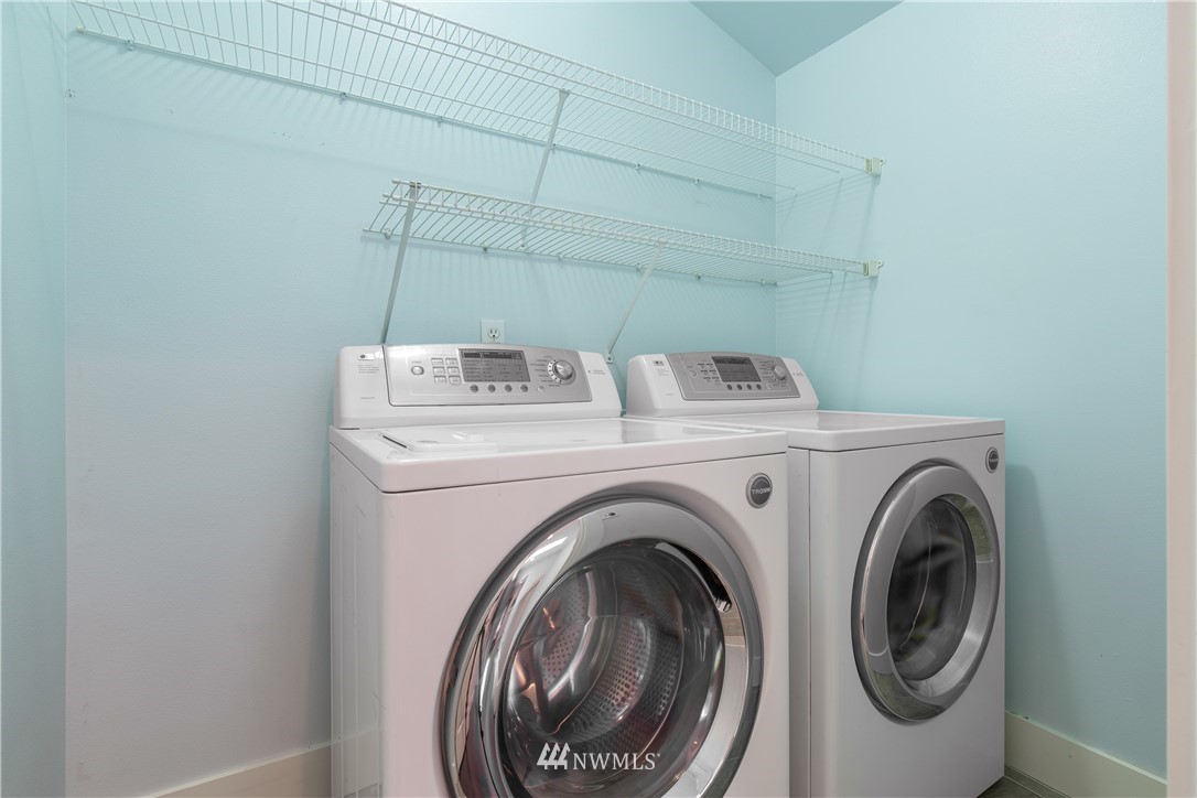 10303 Holman Road North, Unit A Seattle, WA 98177 - Photo 37 of 40 a utility room with dryer and washer