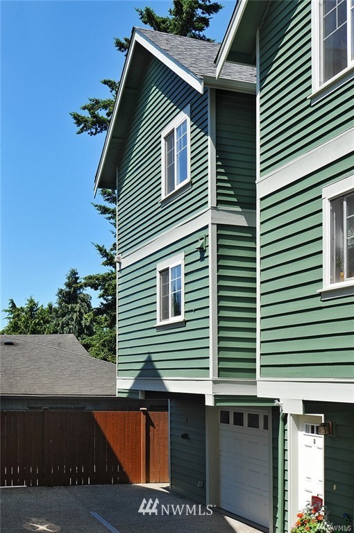 10303 Holman Road North, Unit A Seattle, WA 98177 - Photo 38 of 40 a front view of a house with plants