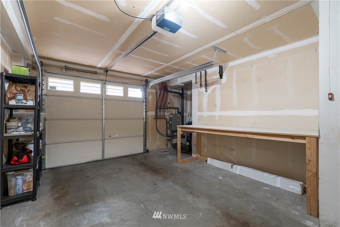 10303 Holman Road North, Unit A Seattle, WA 98177 - Photo 40 of 40 a view of a garage with storage