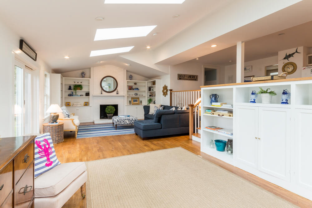 29 Clevelandtown Road Edgartown, MA 02539 - Photo 13 of 32 a living room with furniture and a fireplace
