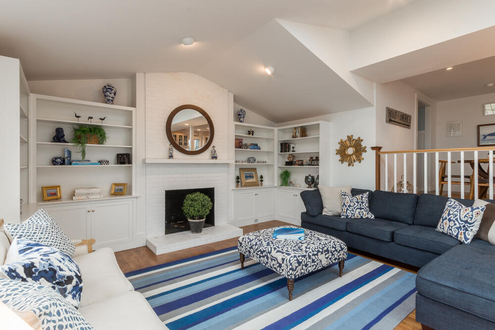29 Clevelandtown Road Edgartown, MA 02539 - Photo 14 of 32 a living room with furniture and a fireplace