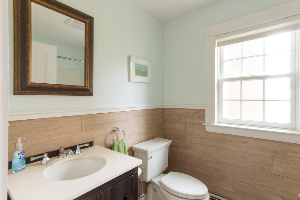 29 Clevelandtown Road Edgartown, MA 02539 - Photo 17 of 32 a bathroom with a sink a toilet and a mirror