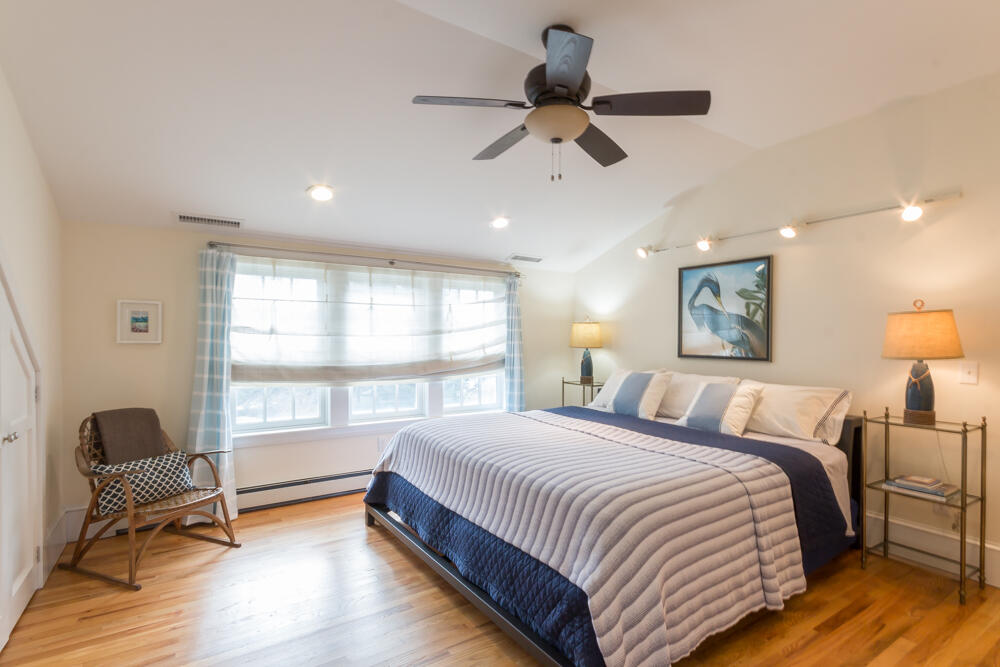 29 Clevelandtown Road Edgartown, MA 02539 - Photo 18 of 32 a bedroom with a bed and a window