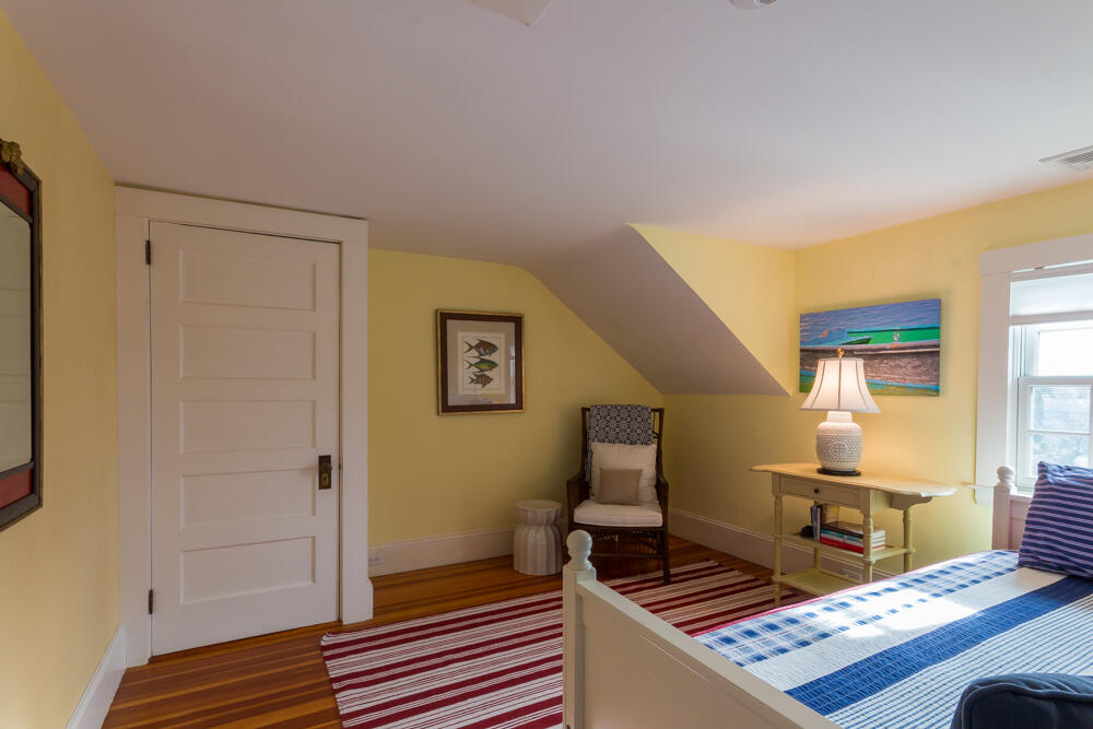 29 Clevelandtown Road Edgartown, MA 02539 - Photo 24 of 32 a living room with furniture and a rug