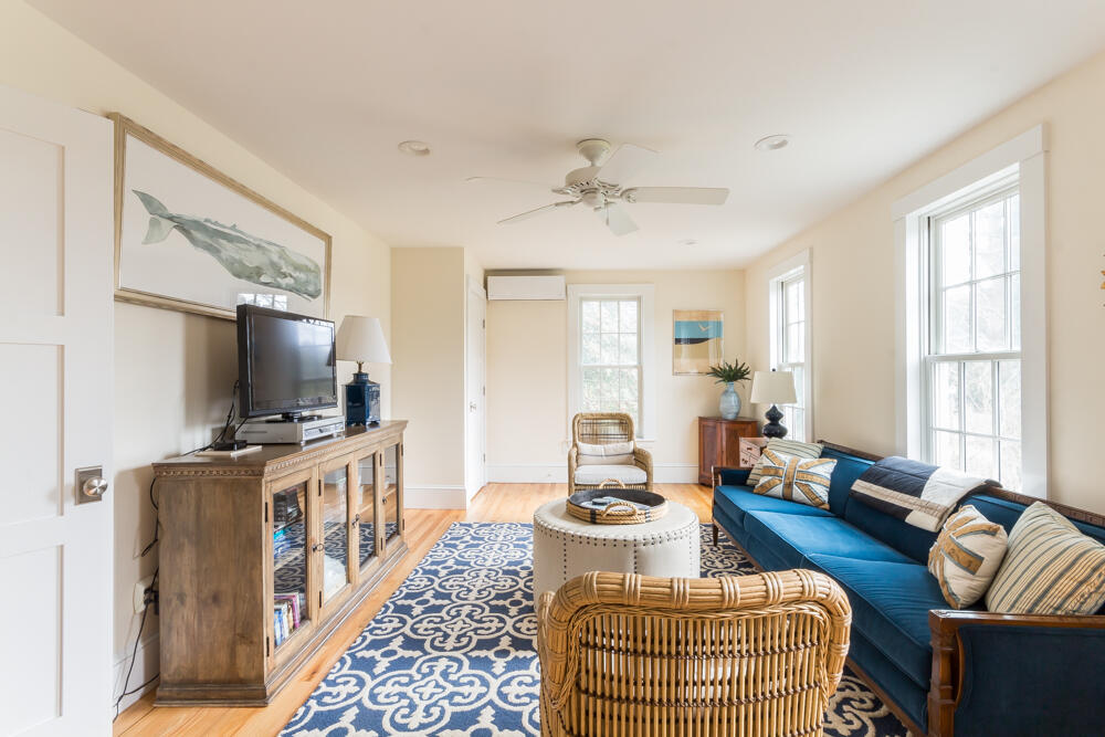 29 Clevelandtown Road Edgartown, MA 02539 - Photo 8 of 32 a living room with furniture and a flat screen tv