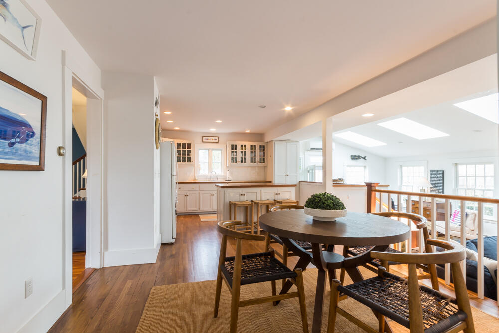 29 Clevelandtown Road Edgartown, MA 02539 - Photo 10 of 32 a view of a dining room with furniture and wooden floor