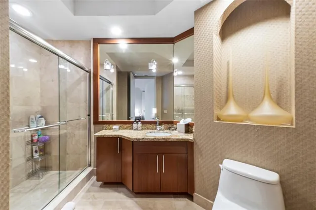 a balcony with view of outdoor space