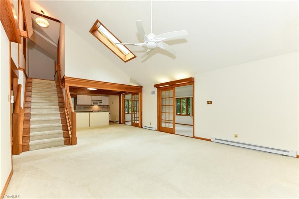 7205 Haw Ridge Road Summerfield, NC 27358 - Photo 50 of 50 Open floor plan: great room, dining room, kitchen on 1st floor
