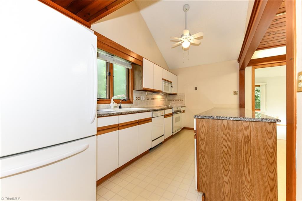 7205 Haw Ridge Road Summerfield, NC 27358 - Photo 12 of 50 1st floor kitchen