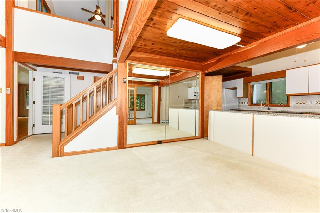 7205 Haw Ridge Road Summerfield, NC 27358 - Photo 16 of 50 Dining room and kitchen on 1st floor