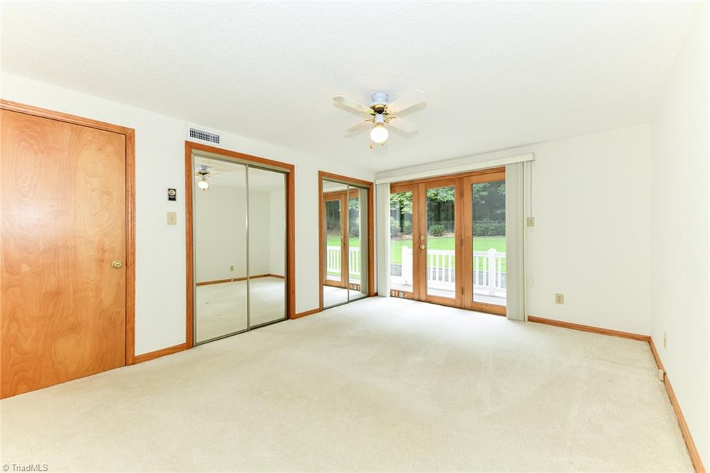 7205 Haw Ridge Road Summerfield, NC 27358 - Photo 17 of 50 Primary bedroom