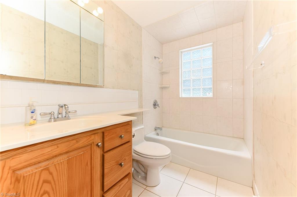 7205 Haw Ridge Road Summerfield, NC 27358 - Photo 18 of 50 1st floor bathroom